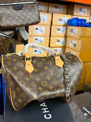 The Signature Barrel Bag