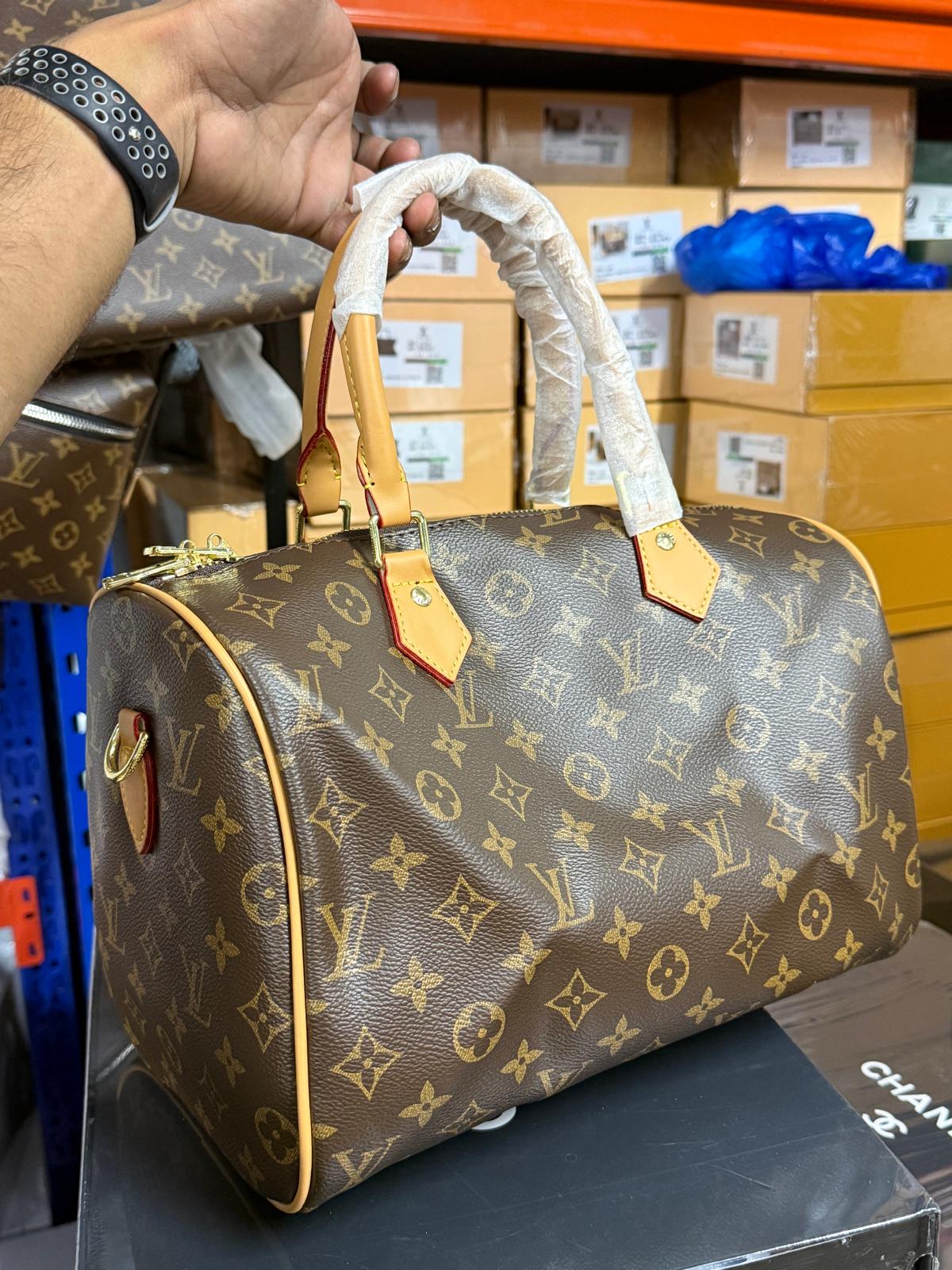 The Signature Barrel Bag
